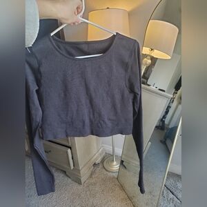 Preloved Lululemon Black ribbed Long Sleeve Crop Top, about a size 8